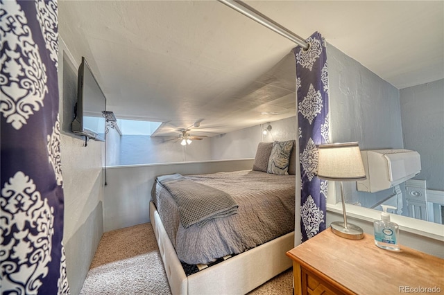 bedroom featuring a ceiling fan and carpet floors