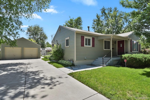 4546 S Logan St, Englewood, CO 80113 - single story home featuring a detached garage, an outbuilding, and a front yard
