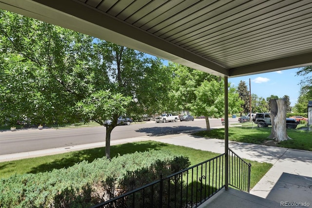 4546 S Logan St, Englewood, CO 80113 - covered porch featuring a lawn