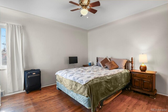 4546 S Logan St, Englewood, CO 80113 - bedroom featuring wood-type flooring and a ceiling fan