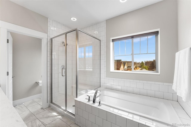 bathroom with independent shower and bath