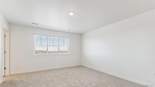 empty room with light carpet