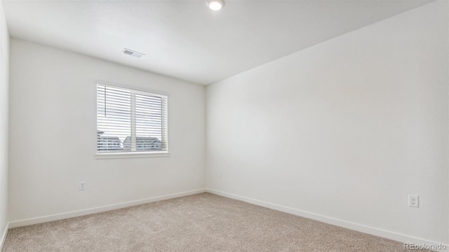 view of carpeted spare room