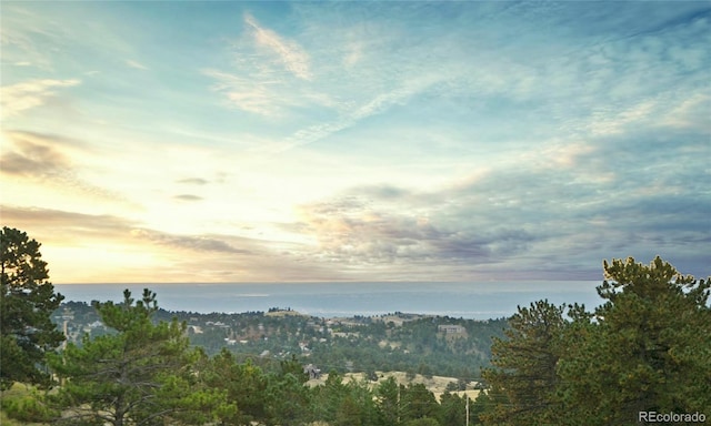 view of mountain feature featuring a water view