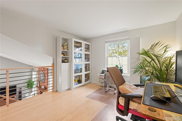 office space with hardwood / wood-style floors