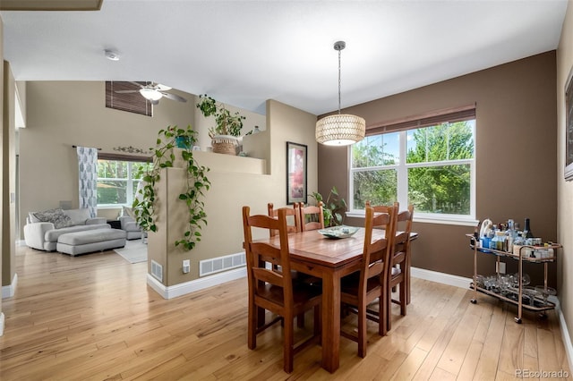 902 Jarvis Dr, Erie, CO 80516 - dining room featuring a ceiling fan, baseboards, and light wood-style floors