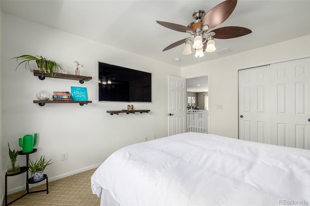 902 Jarvis Dr, Erie, CO 80516 - bedroom with light colored carpet, baseboards, a closet, and ceiling fan