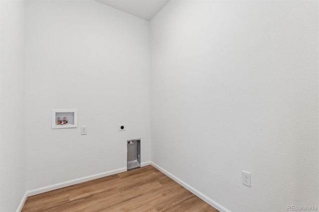 laundry area with hardwood / wood-style floors, washer hookup, and hookup for an electric dryer