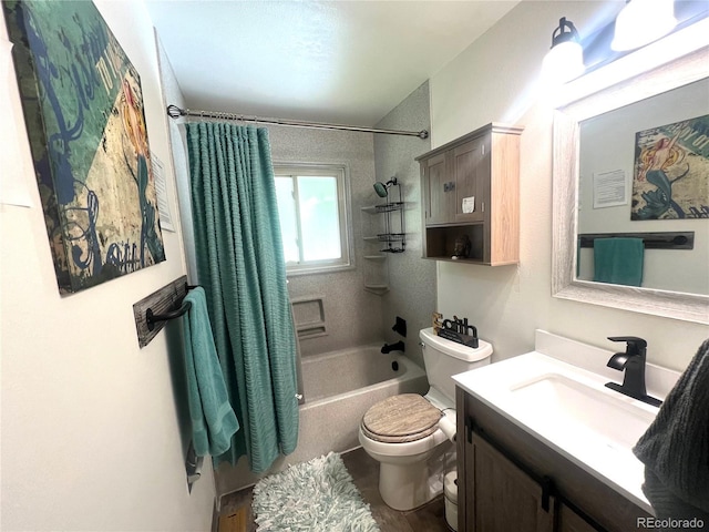 full bath with shower / bath combo, vanity, and toilet