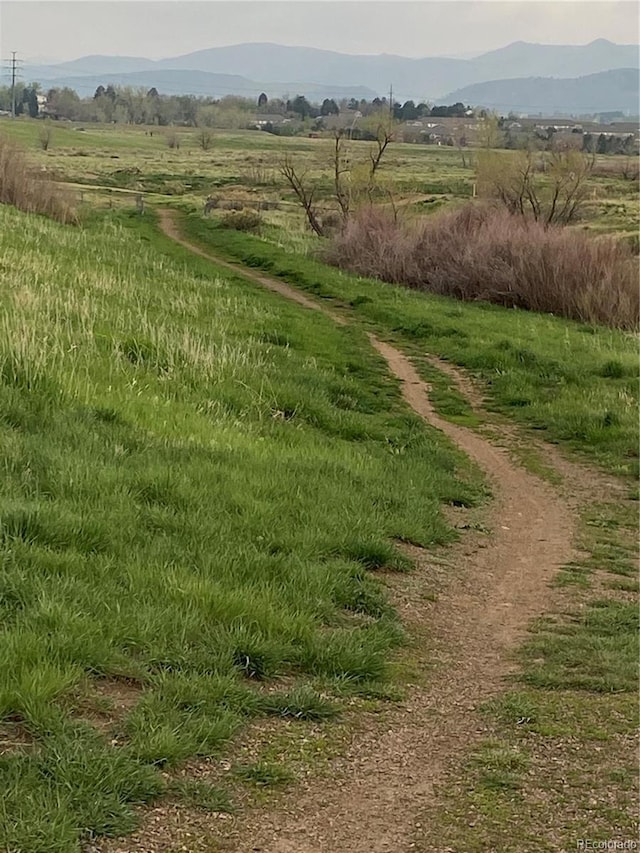 exterior space featuring a rural view and a mountain view