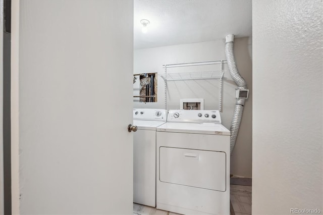 6490 S Dayton St Unit L02, Englewood, CO 80111 - washroom with washer and dryer