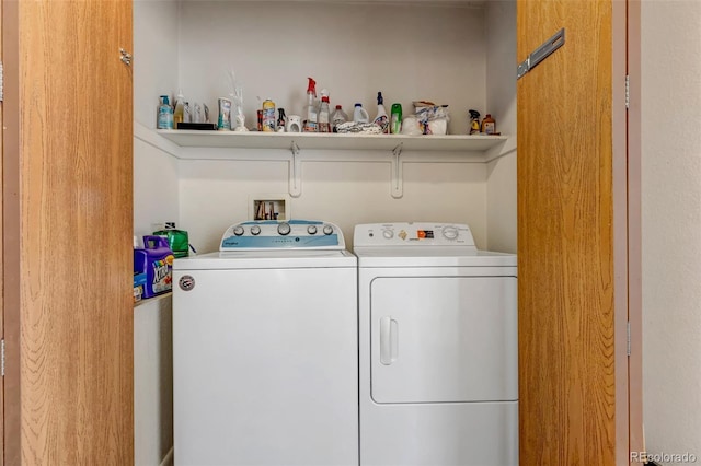 laundry area featuring laundry area and independent washer and dryer