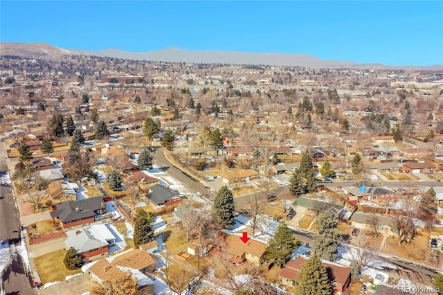 drone / aerial view featuring a mountain view and a residential view