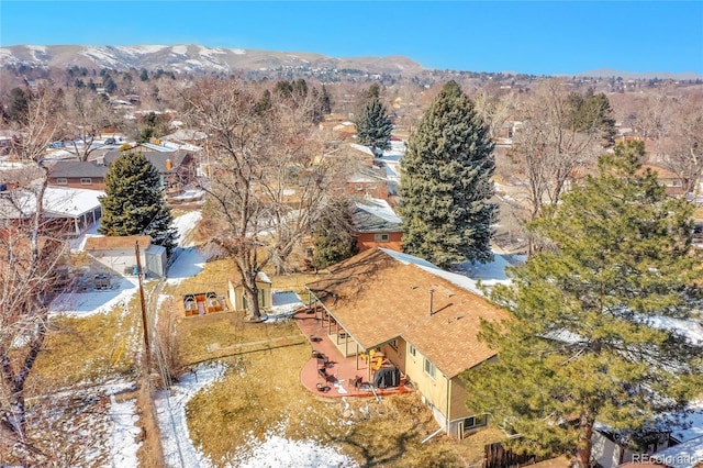 drone / aerial view featuring a mountain view