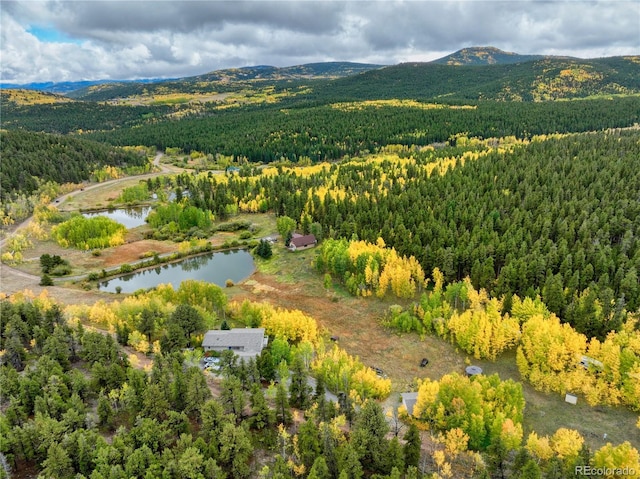 aerial view with a water and mountain view