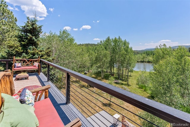 balcony featuring a water view