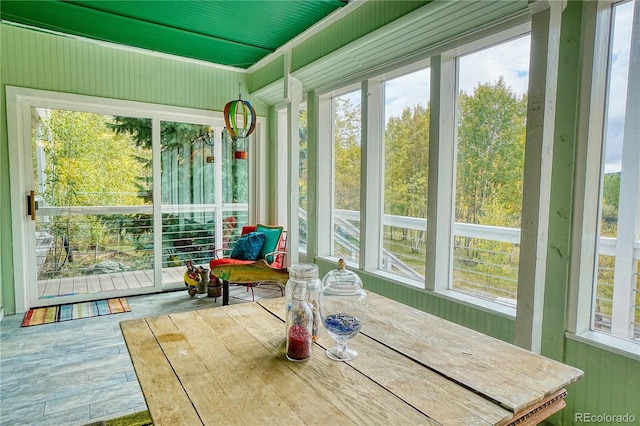 sunroom featuring a healthy amount of sunlight