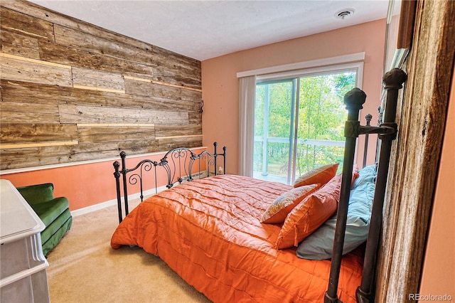 bedroom featuring light colored carpet