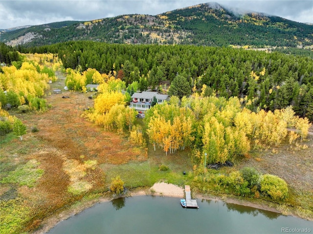 bird's eye view featuring a water and mountain view