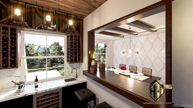 7969 Forest Keep Cir, Parker, CO 80134 - indoor wet bar with beverage cooler, an accent wall, and a chandelier