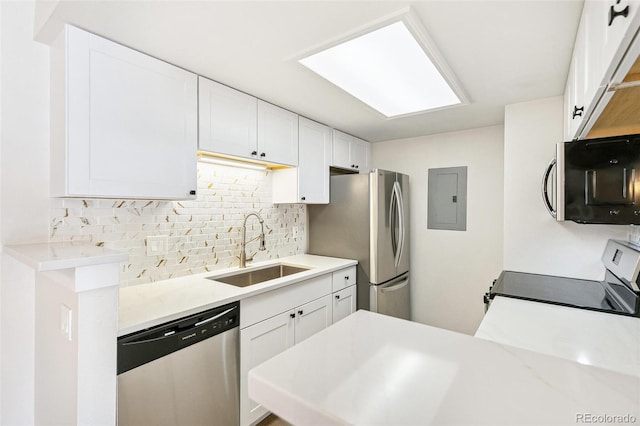 18302 E Kepner Pl Unit 207, Aurora, CO 80017 - kitchen with appliances with stainless steel finishes, electric panel, tasteful backsplash, and white cabinets