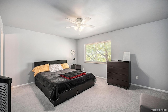 12289 W Atlantic Ave, Lakewood, CO 80228 - bedroom with baseboards, carpet floors, and ceiling fan