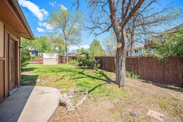 12289 W Atlantic Ave, Lakewood, CO 80228 - view of yard featuring a patio area