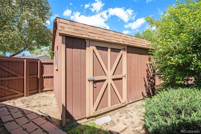 12289 W Atlantic Ave, Lakewood, CO 80228 - view of shed featuring fence