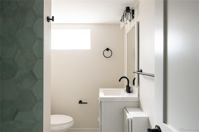 1219 Cherry St, Denver, CO 80220 - bathroom with toilet, vanity, and tiled shower