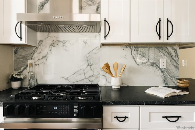 1219 Cherry St, Denver, CO 80220 - kitchen featuring wall chimney exhaust hood, backsplash, black range with gas cooktop, and white cabinetry