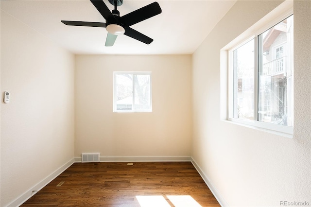 1219 Cherry St, Denver, CO 80220 - empty room with visible vents, a ceiling fan, baseboards, and dark wood-style flooring