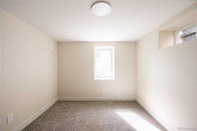 1219 Cherry St, Denver, CO 80220 - carpeted spare room featuring baseboards