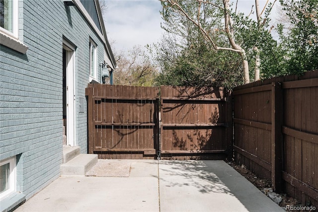1219 Cherry St, Denver, CO 80220 - view of gate featuring fence and a patio