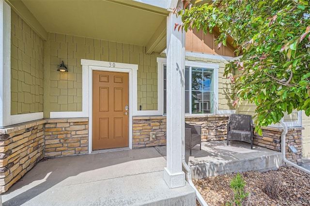 6024 W 1st St Unit 30, Greeley, CO 80634 - property entrance with stone siding and covered porch