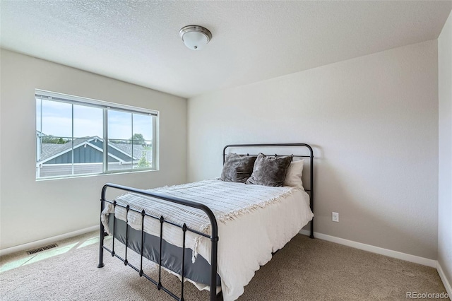 6024 W 1st St Unit 30, Greeley, CO 80634 - bedroom featuring carpet floors and baseboards