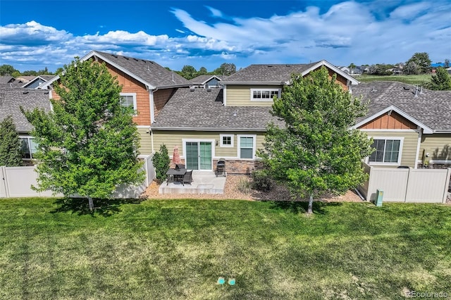 6024 W 1st St Unit 30, Greeley, CO 80634 - rear view of property with a patio, a shingled roof, a residential view, and stone siding