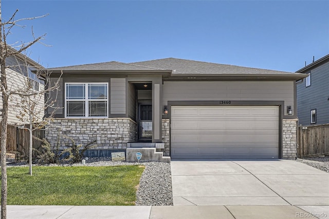 13460 Broad Wing Ave, Parker, CO 80134 - view of front facade featuring stone siding, a garage, and concrete driveway