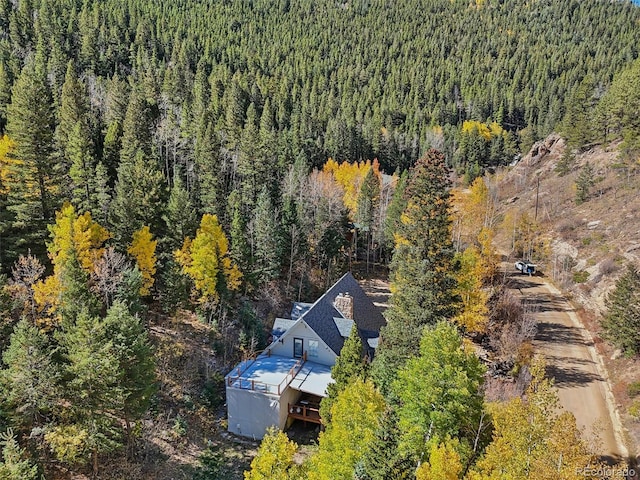 aerial view with a wooded view