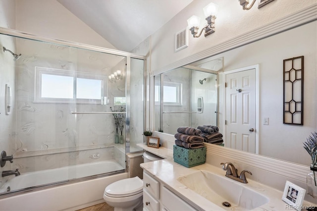 full bathroom featuring shower / bath combination with glass door, toilet, a wealth of natural light, and lofted ceiling