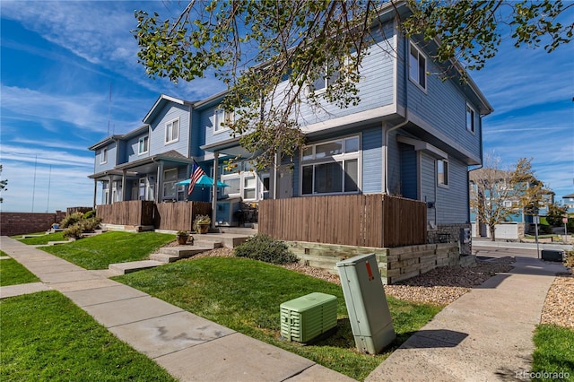 view of property exterior with a lawn