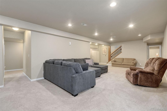 living room featuring light carpet