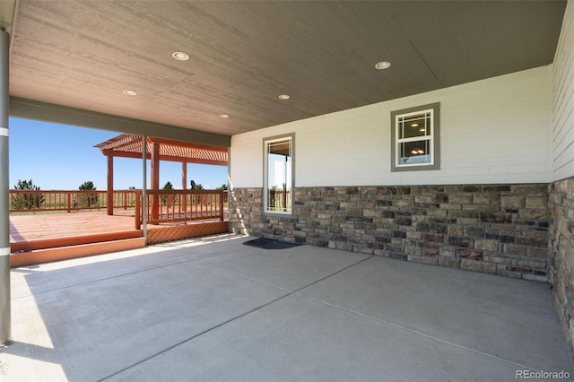 view of patio / terrace featuring a wooden deck