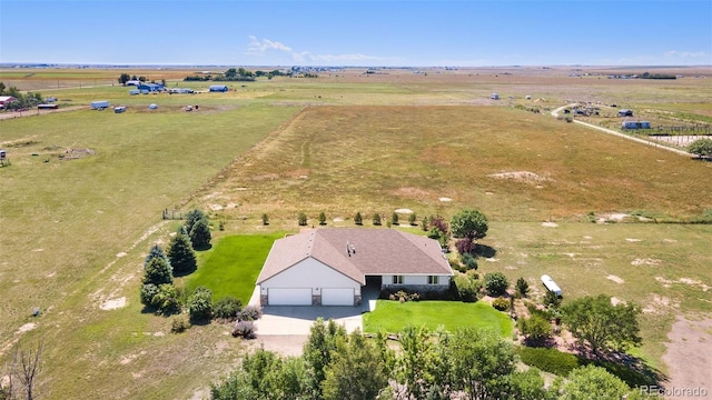 birds eye view of property featuring a rural view