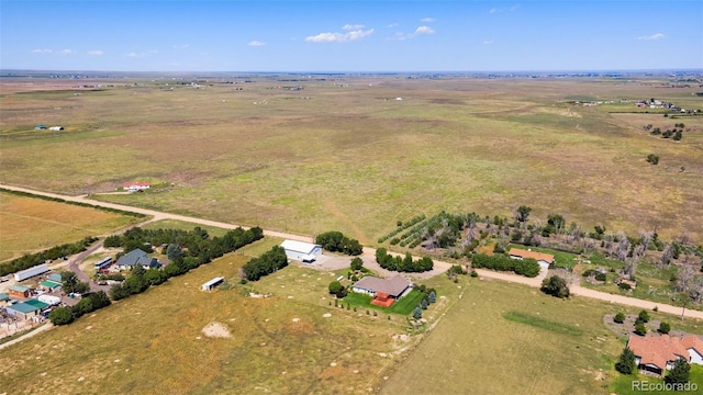 birds eye view of property featuring a rural view