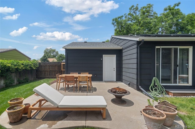 5170 Deephaven Ct, Denver, CO 80239 - view of patio / terrace with a fire pit and outdoor dining space