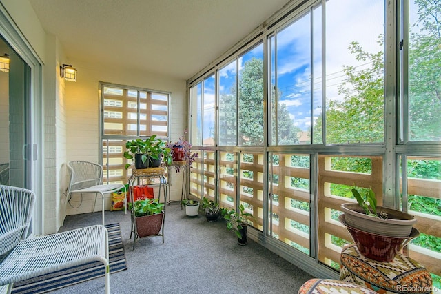 610 S Clinton St Unit 8C, Denver, CO 80247 - sunroom / solarium featuring healthy amount of natural light