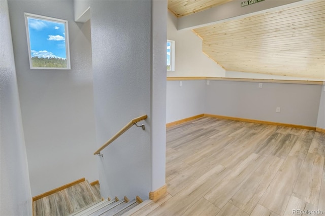 85 Estes Cir, Florissant, CO 80816 - staircase with wooden ceiling, wood finished floors, lofted ceiling, and baseboards