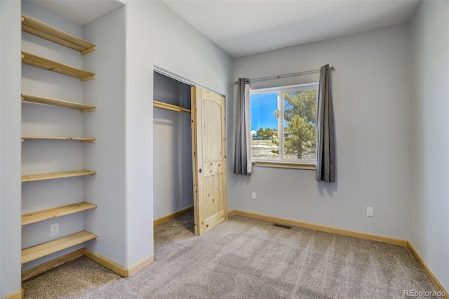 85 Estes Cir, Florissant, CO 80816 - unfurnished bedroom featuring carpet, baseboards, and a closet
