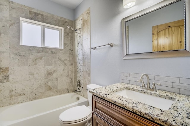85 Estes Cir, Florissant, CO 80816 - bathroom featuring vanity, toilet, tasteful backsplash, and bathtub / shower combination