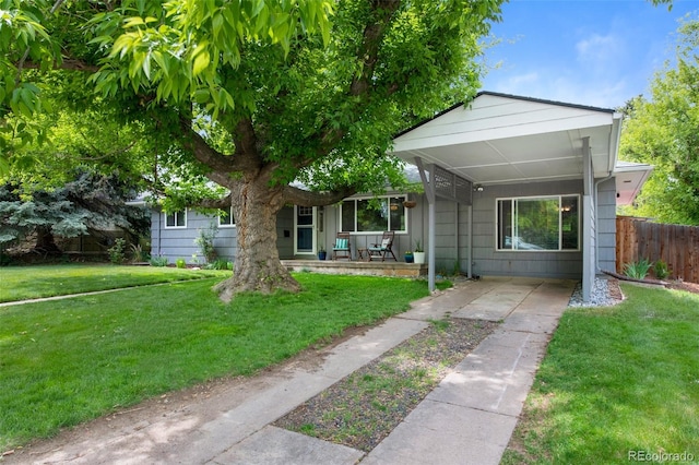 6283 S Prescott St, Littleton, CO 80120 - view of front facade featuring driveway, an attached carport, and a porch